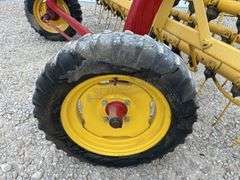 New Holland 258 side delivery hay rake w/ dolly wheels