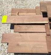 Group of 1" thick rough sawn walnut lumber