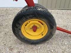 New Holland 258 side delivery hay rake w/ dolly wheels