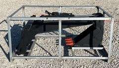 Unused skid steer fixed arm backhoe w/ 14" bucket