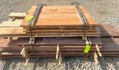 Group of walnut, cherry & oak rough cut lumber