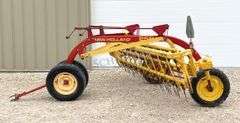 New Holland 258 side delivery hay rake w/ dolly wheels