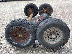 2- 6 lug rubber torsion axles w/ wheels & tires