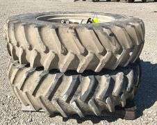 Pair of Firestone 18.4-38 tractor tires on rims w/ hubs