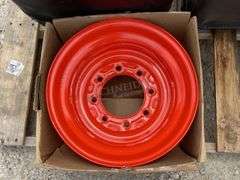 2-unused equipment seats & a Kubota rim