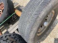 2- 6 lug rubber torsion axles w/ wheels & tires