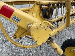 New Holland 258 side delivery hay rake w/ dolly wheels