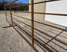 Unused 24' freestanding corral panel w/ 8' gate on 1 end