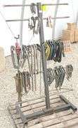 Group of clamps w/ rolling storage rack