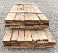 Group of rough sawn 1" thick red oak lumber up to 12.5' long