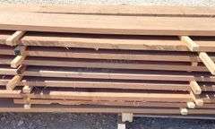 Group of 1" thick rough sawn walnut lumber