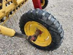 New Holland 258 side delivery hay rake w/ dolly wheels