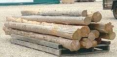 Group of cedar posts up to 12.5' long