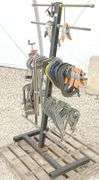 Group of clamps w/ rolling storage rack