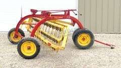 New Holland 258 side delivery hay rake w/ dolly wheels