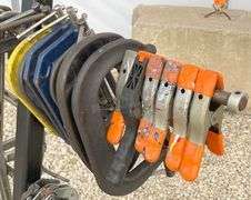 Group of clamps w/ rolling storage rack