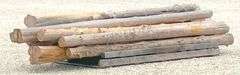 Group of cedar posts up to 12.5' long