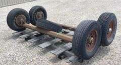 2- 6 lug rubber torsion axles w/ wheels & tires