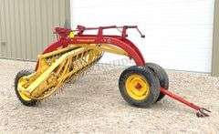 New Holland 258 side delivery hay rake w/ dolly wheels