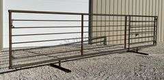 Unused 24' freestanding corral panel w/ 8' gate on 1 end