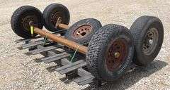 2- 6 lug rubber torsion axles w/ wheels & tires