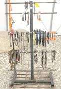 Group of clamps w/ rolling storage rack