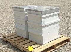 2 wooden bee hives