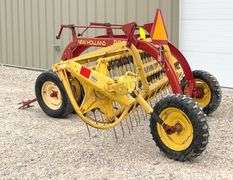 New Holland 258 side delivery hay rake w/ dolly wheels