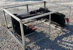 Unused skid steer fixed arm backhoe w/ 14" bucket