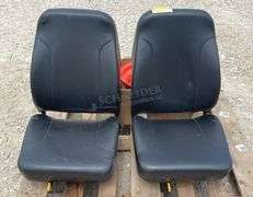2-unused equipment seats & a Kubota rim