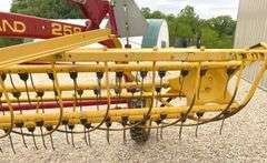 New Holland 258 side delivery hay rake w/ dolly wheels