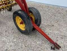 New Holland 258 side delivery hay rake w/ dolly wheels