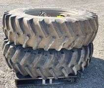 Pair of Firestone 18.4-38 tractor tires on rims w/ hubs