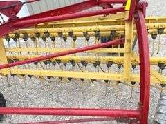 New Holland 258 side delivery hay rake w/ dolly wheels