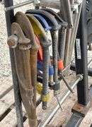 Group of clamps w/ rolling storage rack