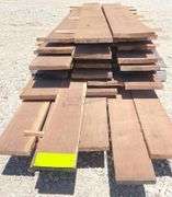 Group of 1" thick rough sawn walnut lumber