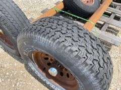 2- 6 lug rubber torsion axles w/ wheels & tires