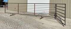 Unused 24' freestanding corral panel w/ 8' gate on 1 end