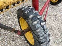 New Holland 258 side delivery hay rake w/ dolly wheels