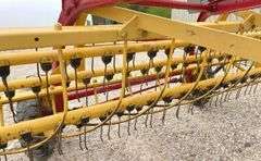 New Holland 258 side delivery hay rake w/ dolly wheels