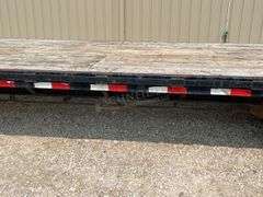2009 PJ 30' flatbed gooseneck trailer