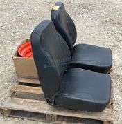 2-unused equipment seats & a Kubota rim