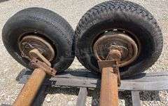 2- 6 lug rubber torsion axles w/ wheels & tires