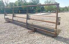 Unused 24' freestanding corral panel w/ bunk feeder
