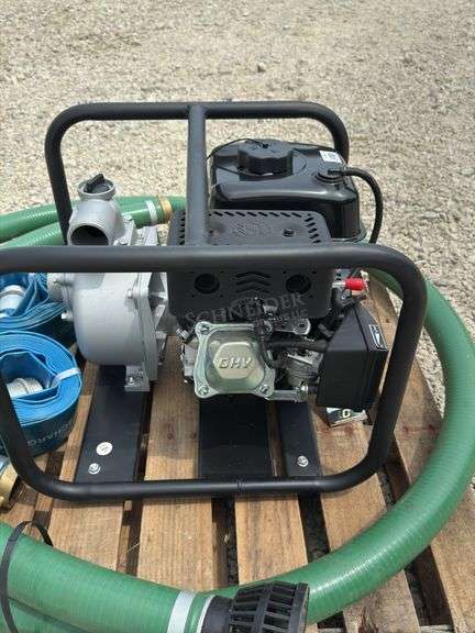 Unused Red Lion 2" gas water pump w/ hoses