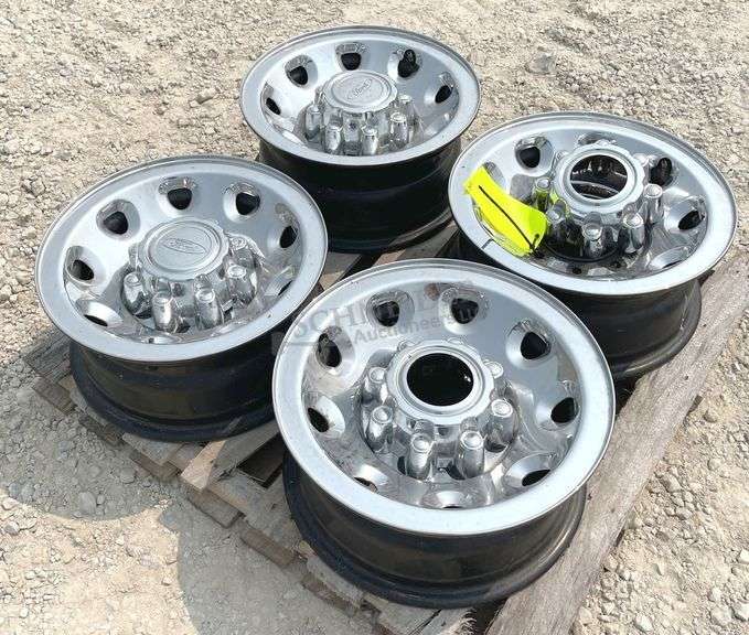 4- Ford chrome clad 16"x7" 8-lug rims w/ center caps