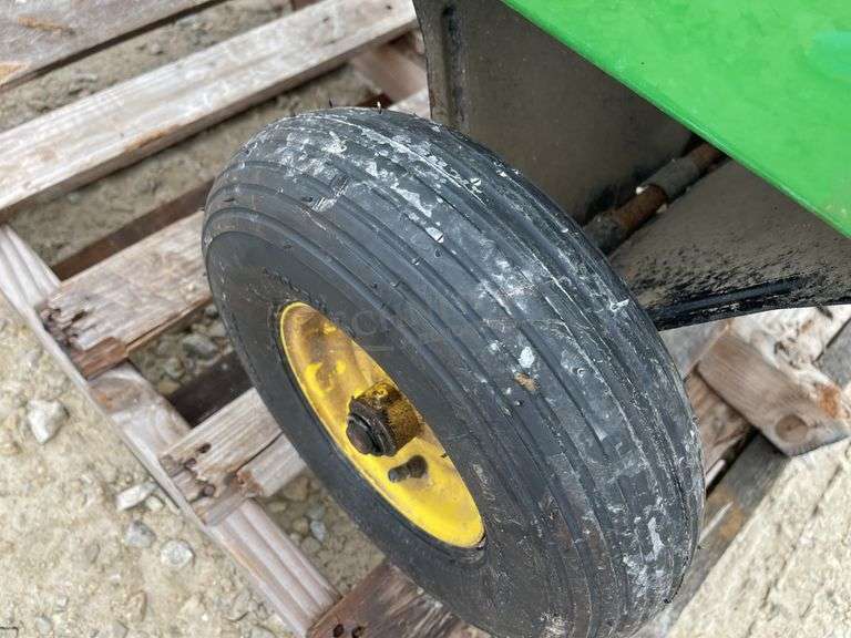 John Deere 10S dump lawn cart