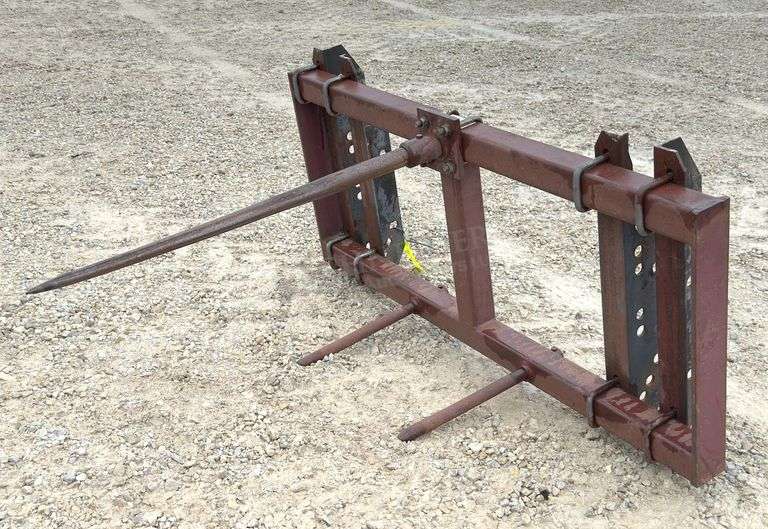 Pin on bale spear for loader w/ adjustable brackets