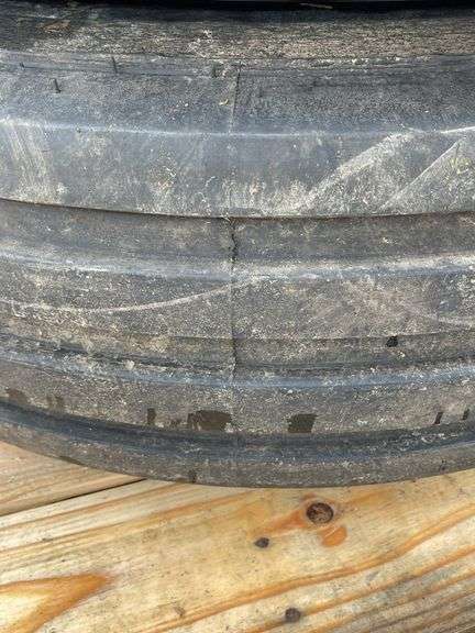 Pair of 16" 16-ply tires on 8-lug JD rims
