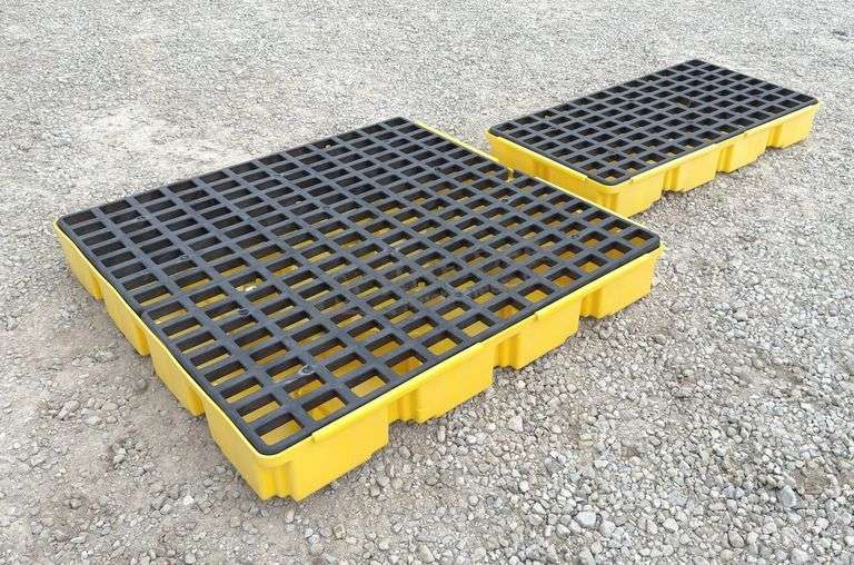 2 Eagle poly spill containment platforms, 1 has a crack